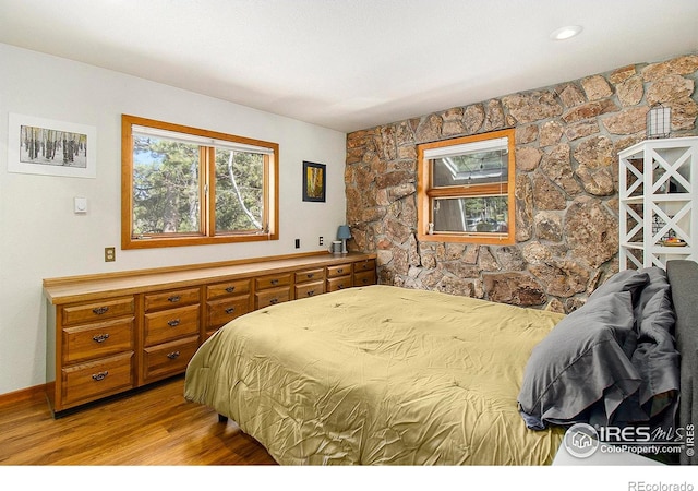 133 Rockledge Cir, Allenspark, CO 80540 - bedroom with light wood finished floors