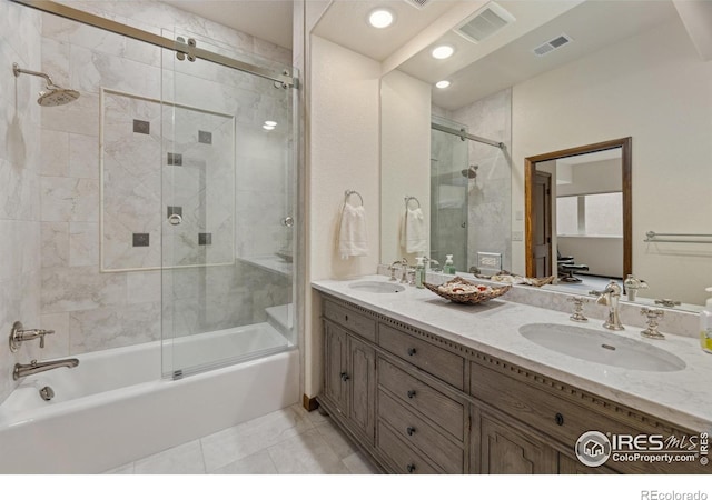 3005 Grey Fox Dr, Estes Park, CO 80517 - bathroom with combined bath / shower with glass door, double vanity, tile patterned floors, and recessed lighting