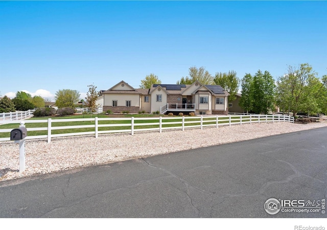 2015 Trail Ridge Dr, Severance, CO 80615 - view of front of house with solar panels
