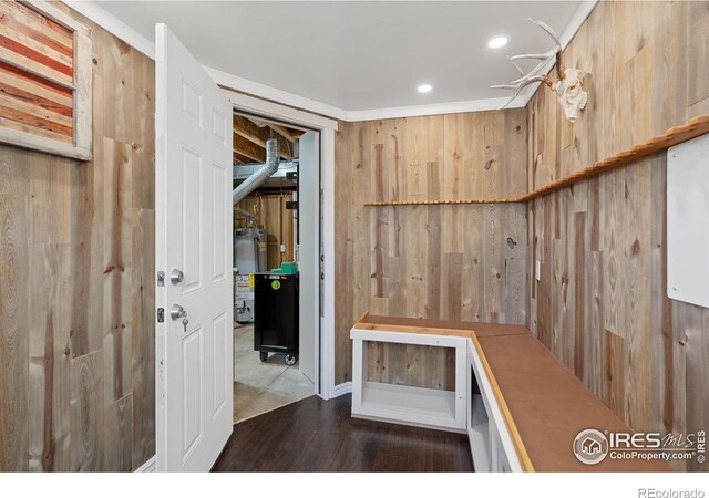 2015 Trail Ridge Dr, Severance, CO 80615 - mudroom with water heater, wood finished floors, recessed lighting, and wood walls