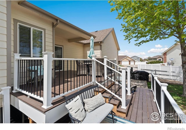 2015 Trail Ridge Dr, Severance, CO 80615 - wooden terrace with fence and a residential view
