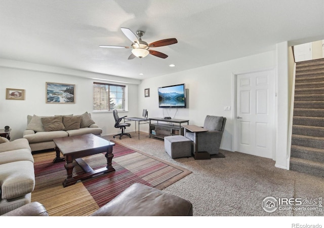 living area with stairs, a ceiling fan, carpet floors, and recessed lighting