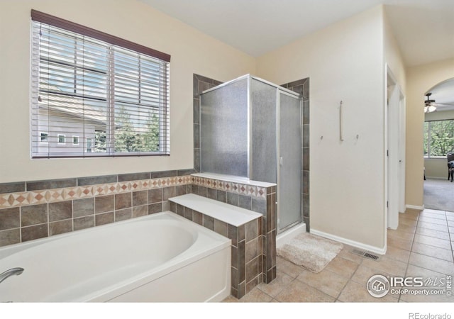 bathroom featuring a shower stall, tile patterned floors, a garden tub, and ceiling fan