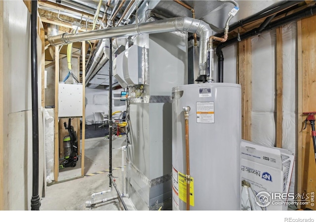utility room featuring water heater