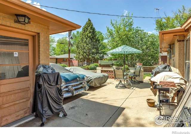 1235 Lincoln St, Longmont, CO 80501 - view of patio / terrace with outdoor dining area