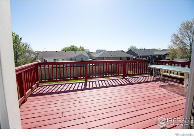 1734 68th Ave, Greeley, CO 80634 - wooden terrace featuring a residential view