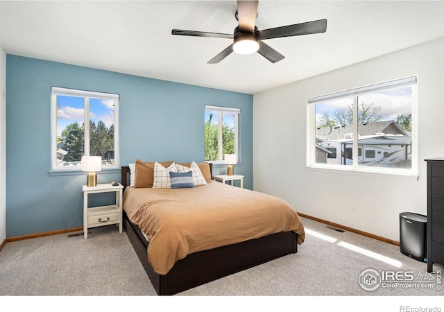 833 Kaitlyn Cir, Loveland, CO 80537 - carpeted bedroom with baseboards and a ceiling fan