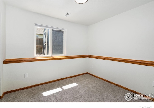 833 Kaitlyn Cir, Loveland, CO 80537 - carpeted spare room featuring baseboards