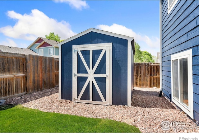 833 Kaitlyn Cir, Loveland, CO 80537 - view of shed featuring a fenced backyard
