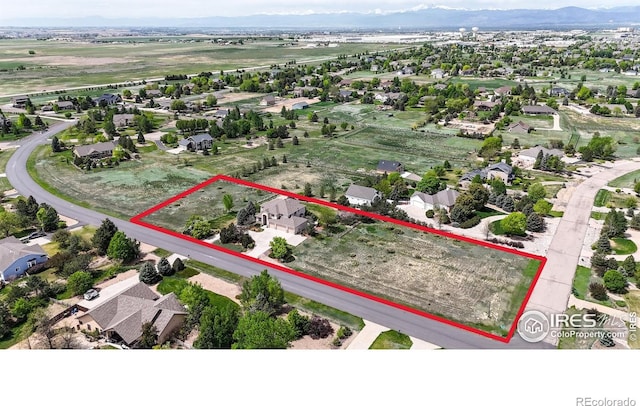 aerial view of residential area with property boundaries highlighted