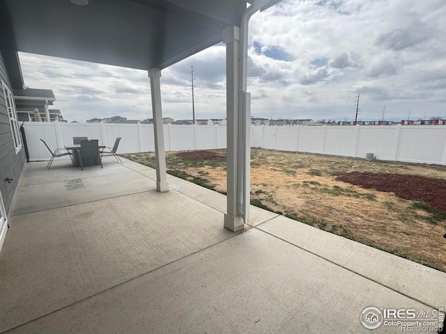401 Bonneville Ave, Fort Lupton, CO 80621 - view of patio / terrace featuring a fenced backyard and outdoor dining area