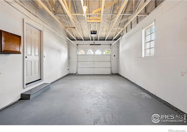 1805 W 22nd St, Loveland, CO 80538 - garage featuring a garage door opener