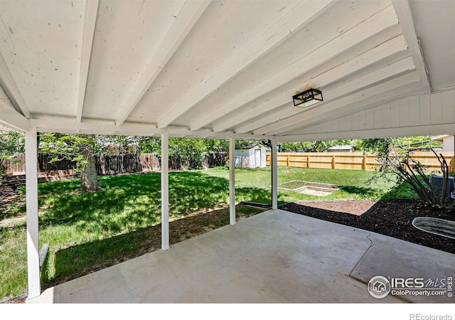 1805 W 22nd St, Loveland, CO 80538 - view of patio / terrace with a storage shed and an outbuilding