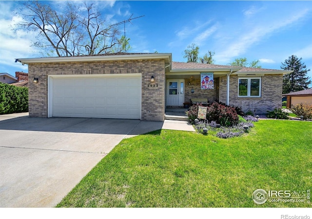 single story home with brick siding, driveway, a front lawn, and an attached garage