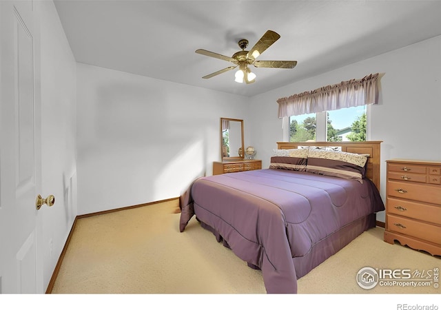 bedroom with baseboards, carpet floors, and ceiling fan