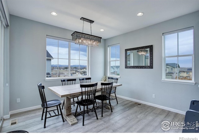 12917 Fox St, Broomfield, CO 80020 - dining room with plenty of natural light, light wood-style floors, baseboards, and recessed lighting