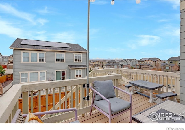 12917 Fox St, Broomfield, CO 80020 - wooden deck with a residential view