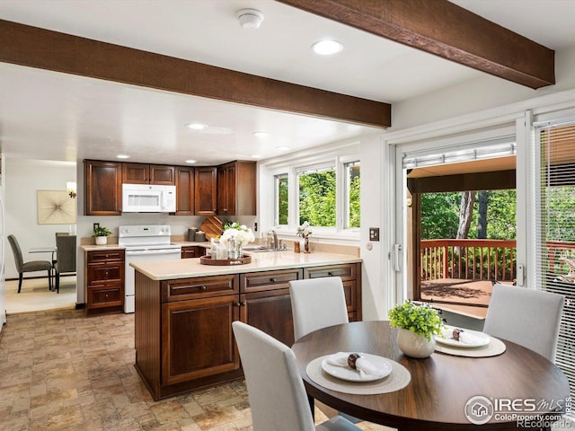 4311 Pali Way, Boulder, CO 80301 - kitchen with white appliances, beamed ceiling, light countertops, a sink, and stone finish floors