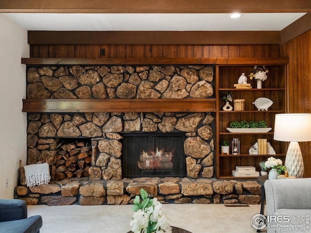 4311 Pali Way, Boulder, CO 80301 - living room with carpet, a fireplace, and wood walls