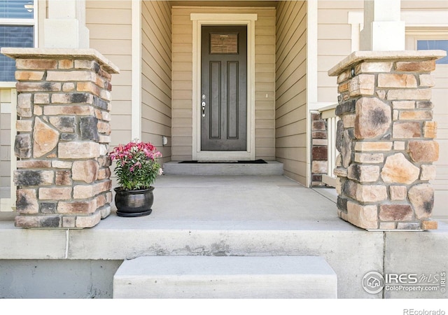 1471 Sabin Ct, Berthoud, CO 80513 - entrance to property with stone siding and a porch
