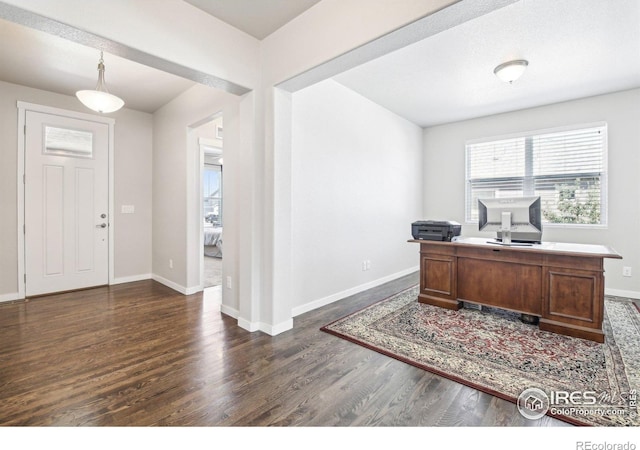 1471 Sabin Ct, Berthoud, CO 80513 - office featuring dark wood-style floors and baseboards