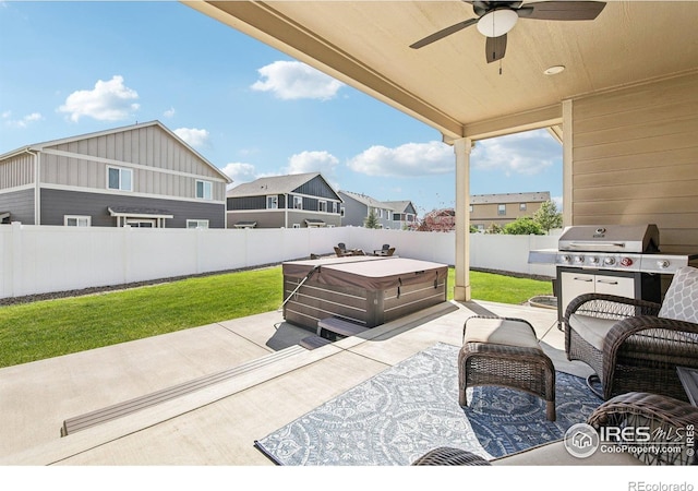 1471 Sabin Ct, Berthoud, CO 80513 - view of patio / terrace with a hot tub, a ceiling fan, grilling area, and a residential view