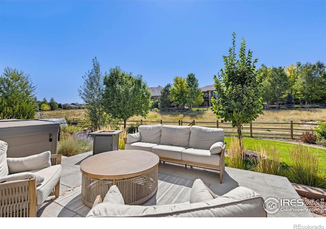 8265 Blackwood Dr, Windsor, CO 80550 - view of patio / terrace featuring an outdoor hangout area and fence