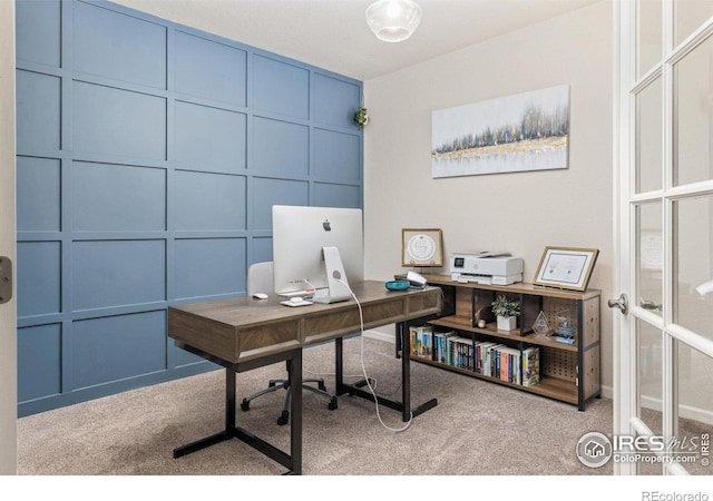 8265 Blackwood Dr, Windsor, CO 80550 - carpeted office with a decorative wall