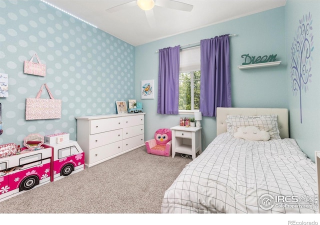 8265 Blackwood Dr, Windsor, CO 80550 - carpeted bedroom with wallpapered walls and ceiling fan