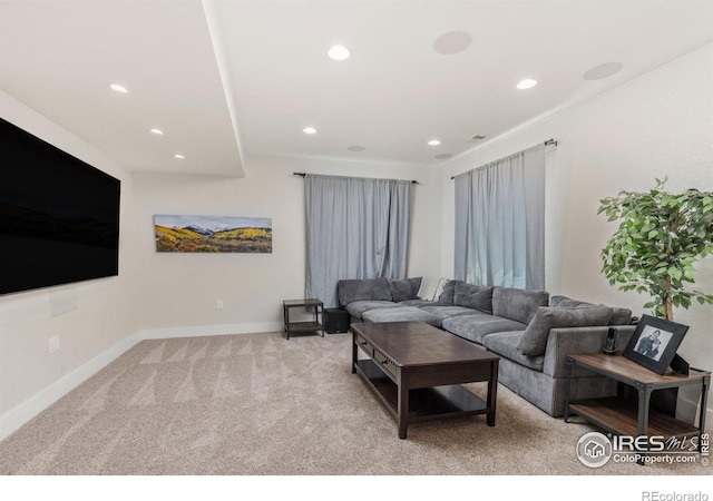 8265 Blackwood Dr, Windsor, CO 80550 - carpeted living area with recessed lighting and baseboards