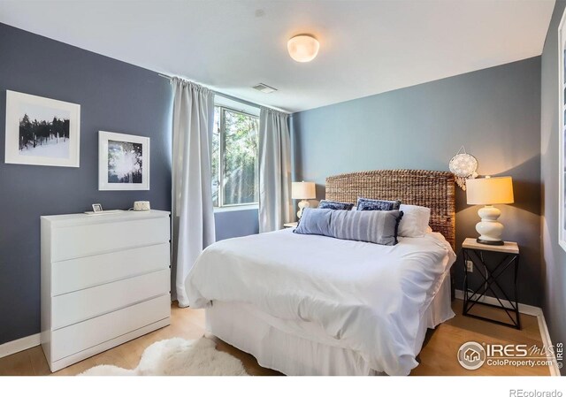 1149 Quince Ave, Boulder, CO 80304 - bedroom featuring baseboards and light wood-style flooring