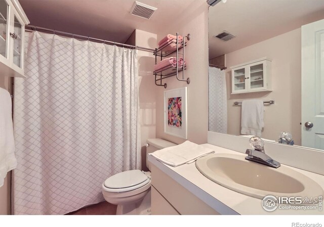1149 Quince Ave, Boulder, CO 80304 - full bath with toilet, vanity, and tile patterned floors