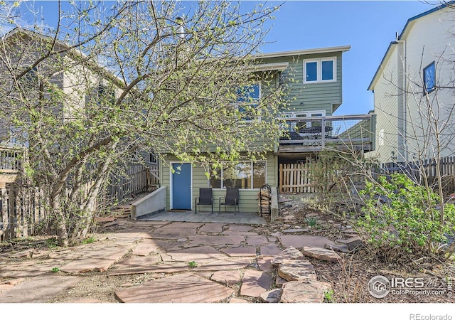 1149 Quince Ave, Boulder, CO 80304 - rear view of house with a patio area, fence, and a deck