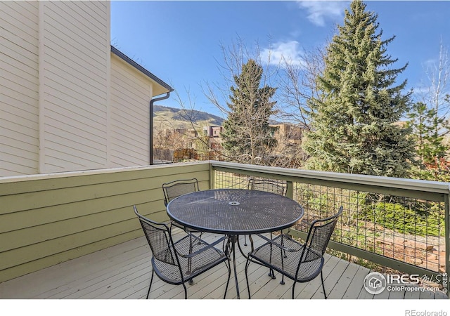 1149 Quince Ave, Boulder, CO 80304 - wooden deck with outdoor dining space and a mountain view