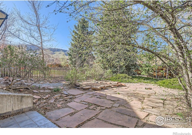 1149 Quince Ave, Boulder, CO 80304 - view of patio / terrace with fence and a mountain view