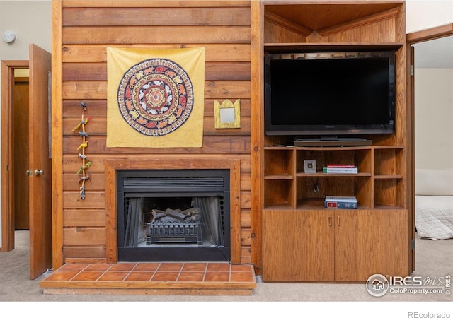 2962 Shadow Creek Dr # 308, Boulder, CO 80303 - unfurnished living room featuring carpet flooring and a tile fireplace