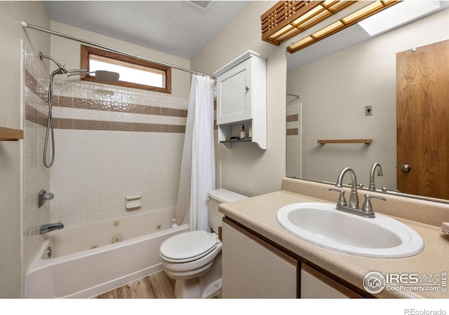 2962 Shadow Creek Dr # 308, Boulder, CO 80303 - bathroom with toilet, shower / tub combo, vanity, and wood finished floors