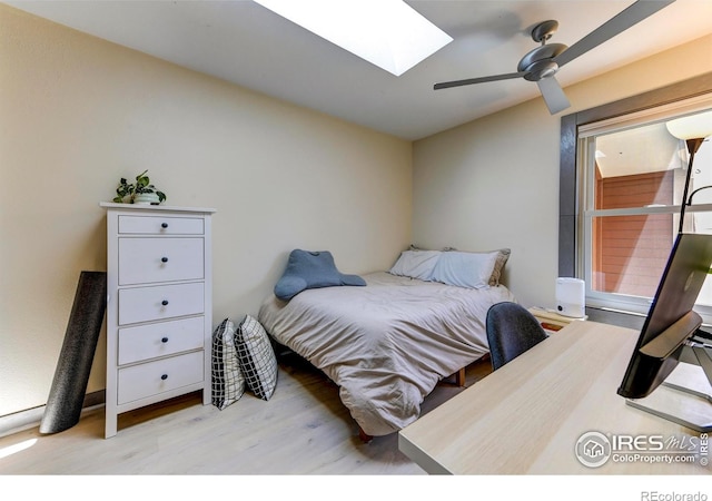 3025 Broadway St Unit 10, Boulder, CO 80304 - bedroom featuring a skylight and wood finished floors