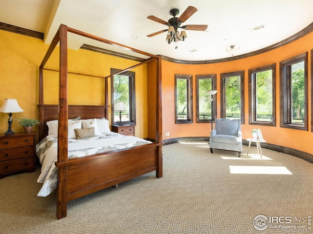 9840 Buckhorn Rd, Loveland, CO 80538 - bedroom with carpet floors, baseboards, and ornamental molding