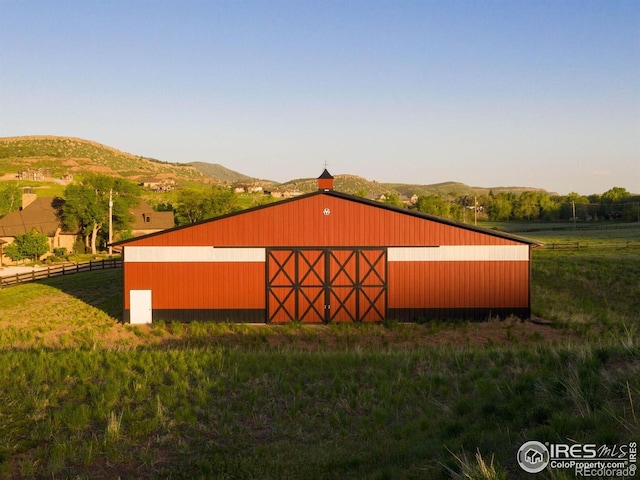 9840 Buckhorn Rd, Loveland, CO 80538 - view of pole building with fence and a mountain view