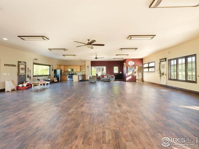 9840 Buckhorn Rd, Loveland, CO 80538 - miscellaneous room with dark wood-type flooring and ceiling fan