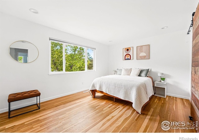 1350 Lehigh St, Boulder, CO 80305 - bedroom featuring wood finished floors and baseboards