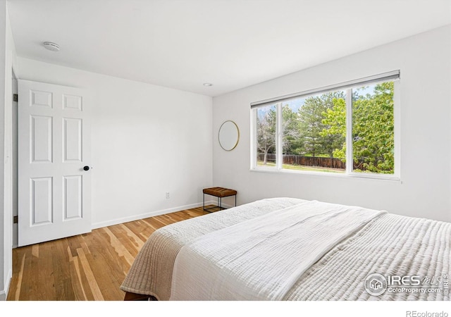 1350 Lehigh St, Boulder, CO 80305 - bedroom featuring wood finished floors and baseboards