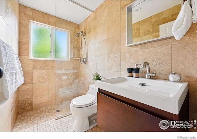 1350 Lehigh St, Boulder, CO 80305 - full bath featuring tile walls, toilet, tiled shower, and vanity