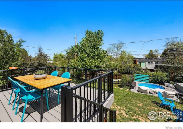 1350 Lehigh St, Boulder, CO 80305 - deck featuring an outdoor pool, outdoor dining space, and a lawn