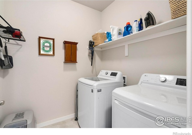 3593 Taylor Walker St, Loveland, CO 80537 - laundry area featuring washing machine and dryer and baseboards