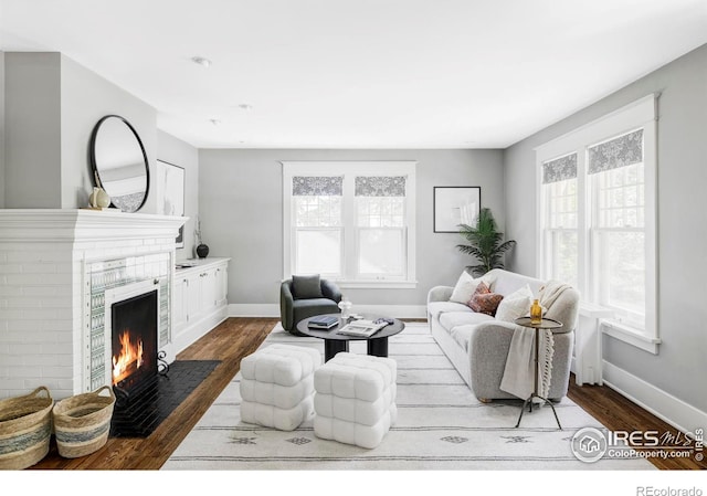 2424 4th St, Boulder, CO 80304 - living room with wood finished floors and a brick fireplace