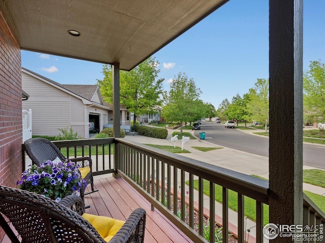 wooden deck featuring a porch