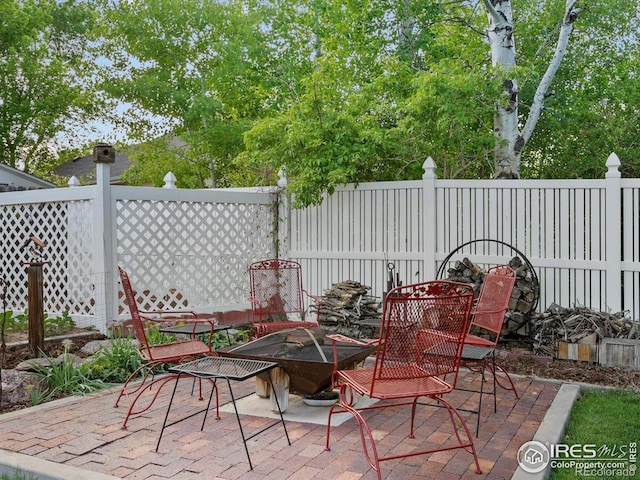view of patio featuring fence