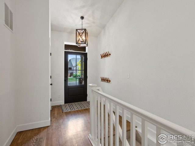 950 Sumner Way, Erie, CO 80516 - foyer entrance with dark wood-type flooring and baseboards